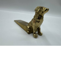 Golden dog door stopper