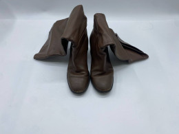 Long brown leather boots