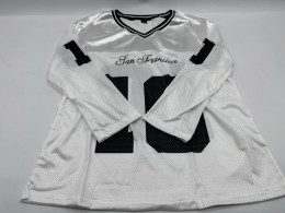 White long-sleeved V-neck shirt White long-sleeved V-neck shirt