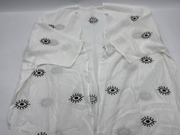 Women's white bathrobe with eye pattern
