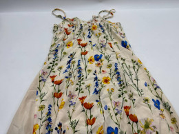 Women's cream colored floral one-shoulder dress 