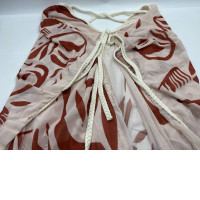 Pink off-shoulder dress with red stripes Pink off-shoulder dress with red stripes