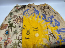 Set of 2 Women's cream-colored gold sun pattern trousers