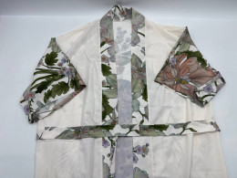 White bathrobe with rose pattern