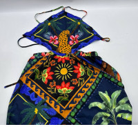 Women's long dress with a blue and black patterned waist slit 