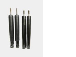 a set of four car shock absorbers