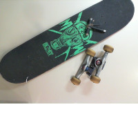 Skateboard disassemblable + assembly key, not new