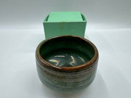 Brown Japanese soup cup in a paper box