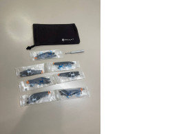 a set of seven propellers complete with a screwdriver and case