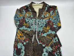 Set of 2 Women's green long-sleeved button-down shirt with dragon pattern and women's green long pants with dragon pattern 