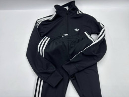 Set of 2 Women's black sports shirt and women's black sports pants 