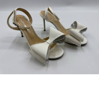 Women's white high heels with bow tie