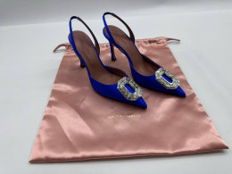 Women's blue high heels with beaded decorations