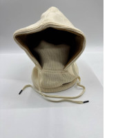 Cream colored hooded winter hat