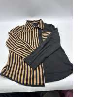 Black long-sleeved shirt with gold stripes 