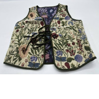 Women's cream colored vest with floral pattern 