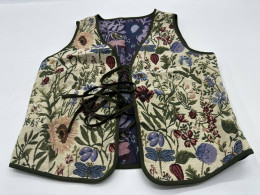 Women's cream colored vest with floral pattern 