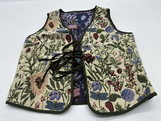 Women's cream colored vest with floral pattern Women's cream colored vest with floral pattern