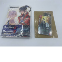 Set of artbook and nintendo switch cartrige and keychain