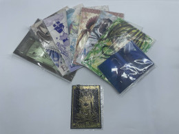 Set of manga books and a postcard