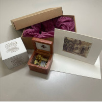music box with a postcard