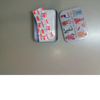 A set in an iron box with a medical plaster