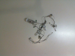 Neck necklace made of pins and light bulbs, plastic