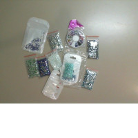 Set of 10 packs of multi-colored rhinestones