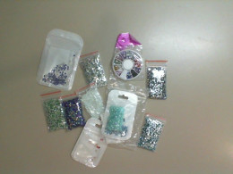 Set of 10 packs of multi-colored rhinestones