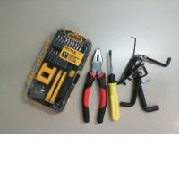 A set of screwdrivers, a set of hex keys, and pliers A set of screwdrivers, a set of hex keys, and pliers