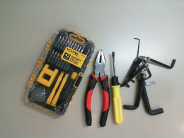 A set of screwdrivers, a set of hex keys, and pliers