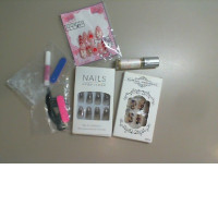 A set of plastic false nails of various designs