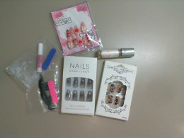 A set of plastic false nails of various designs
