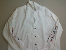 White shirt with embroidered sleeves White shirt with embroidered sleeves