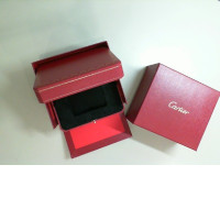 An empty Cartier watch box