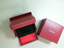 An empty Cartier watch box