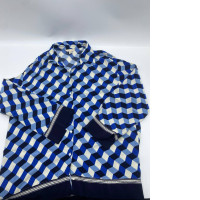 White long-sleeved shirt with blue stripes and buttons 