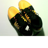 yellow Nike sneakers