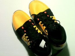 yellow Nike sneakers