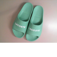 Green rubber Lacoste flip flops, replica