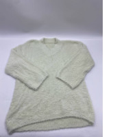 Women's cream-colored long-sleeved sweater