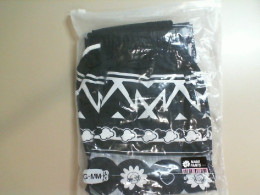 Black shorts with a white pattern on the elastic waistband