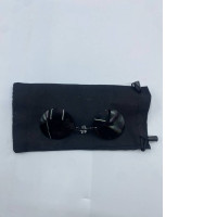 Black glasses for the truth in the black bag