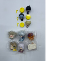 Set of coin-sized anime figures