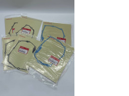 A set of 6 replacement gaskets for a Honda motorcycle.