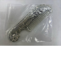 Silver stainless steel comb with koi fish pattern