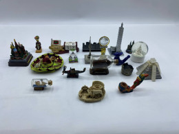 Big Set collection of small souvenirs from world landmarks and travel mementos.