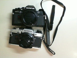Set of 2 Olympus OM-10 cameras, gray and black + carrying cord, used