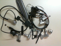 A set of parts for repairing a bass guitar, not new.