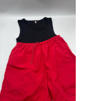 Women's suit: black t-shirt and red shorts